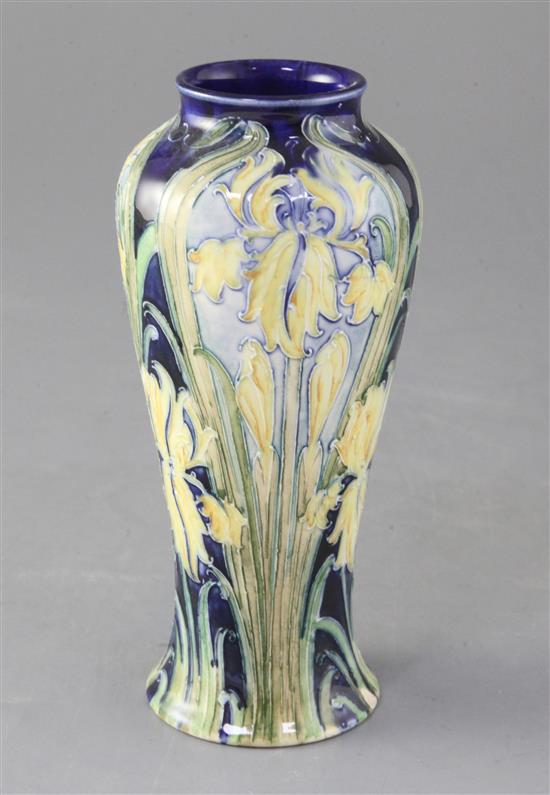 A Moorcroft Macintyre Florian ware small tapered vase, yellow iris design, 16.5cm, small foot chip